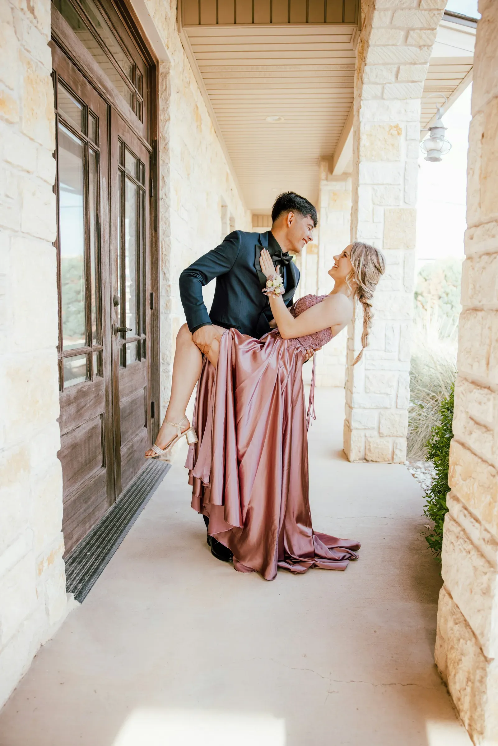 The dip by the front doors — corsage on, nerves gone.