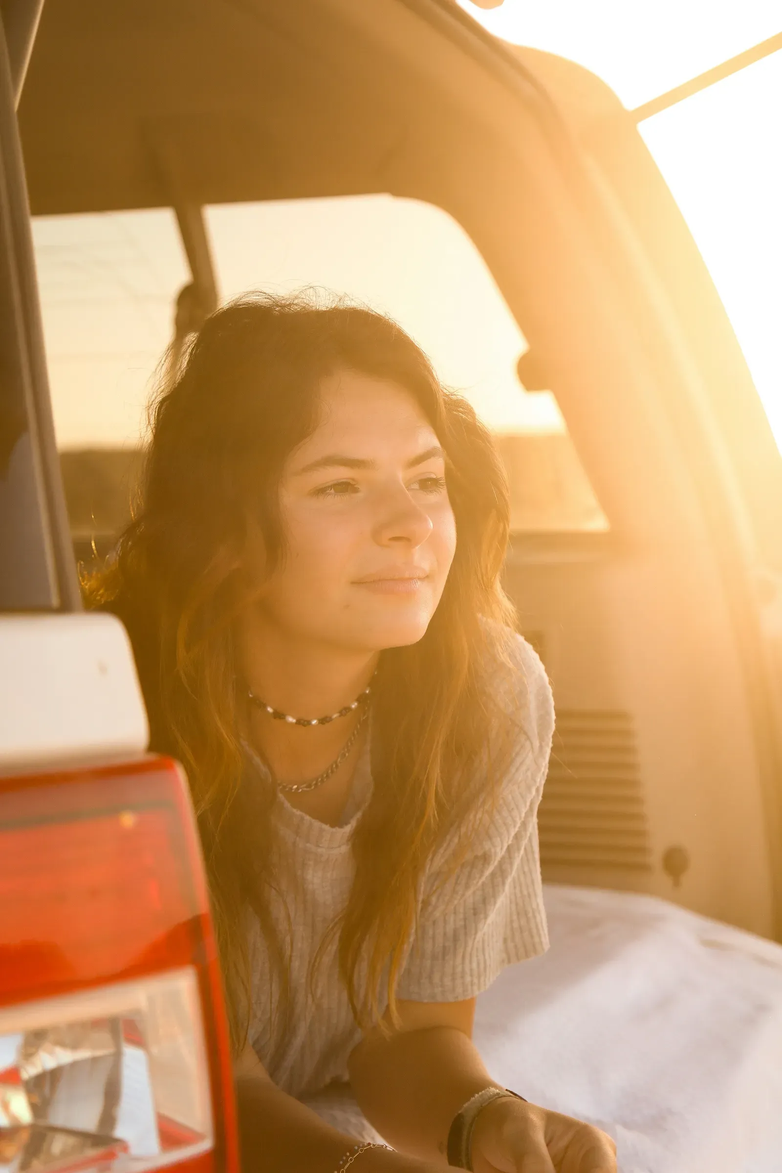 Looking out over the tailgate as the sun drops toward the water.